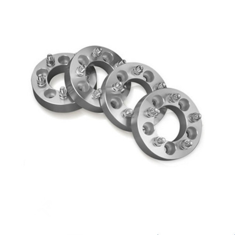 CNC-machined aluminum automotive wheel spacers with studs